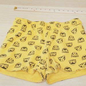 Cat and Jack kids shorts in yellow and cat faces black. Size xl 14/16